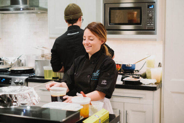 Chef Lauren Mozer in a home cooking scaled