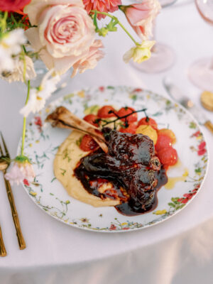 braised lamb shank on polenta with roasted tomatoes scaled