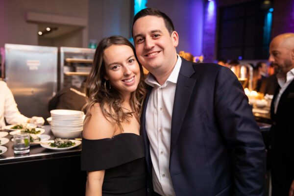 guests in front of open kitchen