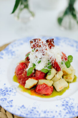 handmade gnocchi with tomato sauce fresh ricotta basil scaled