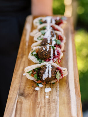 miniature falafel in a mini pita with tahini scaled