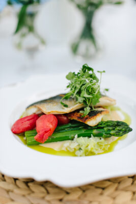 seared branzino leeks asparagus roasted tomatoes parsnip puree scaled